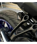 Rugged Rear Brake Fluid Reservoir Guard For Pan America 1250S Motorcycle durable oil tank cover installed on rear wheel.