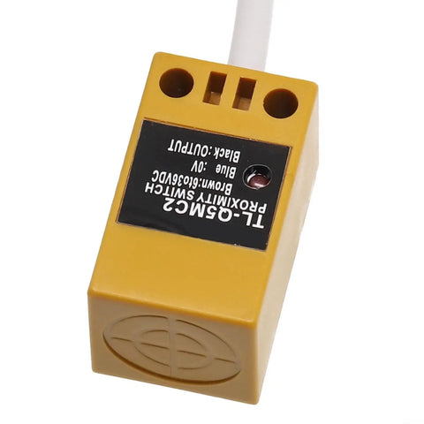 Rock Solid Inductive Proximity Switch Sensor TL Q5MC2 NPN Normally Closed 5mm Sensing Range DC 12 To 24V shown in yellow housing