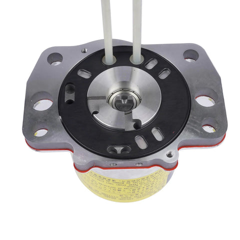 Front view of ABS pump motor assembly; silver housing with black gasket and two white tubes