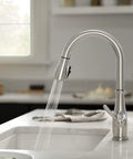 Elmhurst Pull Down Sprayer Kitchen Faucet In Brushed Nickel For Single Hole Install With Two Spray Options And Easy Deck Plate Compatibility Sold Separately, water flowing in kitchen setting