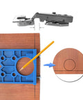 Concealed Hinge Jig 35mm Drilling Guide For Frameless Cabinets And Wardrobes with pencil marking, blue tool on wood surface.