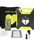 AED Trainer XFT-120GA kit, front view: neon yellow defibrillator trainer with remote and carry bag