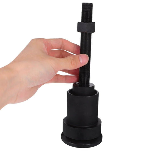 Close-up of a front axle seal installation tool kit for off road vehicle Dana axles shaft type seal puller with differential bearing remover.