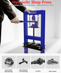 Badass 6 Ton Hydraulic Shop Press With Integrated Bottle Jack Adjustable Stamping Plates And Spacious Work Table showing use in a home garage.