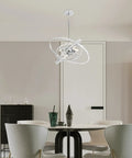 Dope Modern Crystal LED Chandelier With Four Adjustable Ring Designs in dining room setting over round table