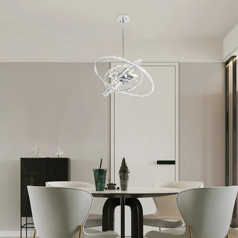 Dope Modern Crystal LED Chandelier With Four Adjustable Ring Designs in dining room setting over round table
