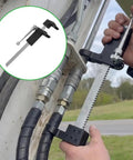 Pro Grade Hydraulic Coupling Tool Built Like A Tank For Quick Disconnect Swaps On Stubborn Lines Featuring A Rock Solid 13/8 Inch Fork Spread For No Sweat Repairs in use on hydraulic hoses.