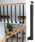 Badass Black Metal Square Stair Railing Kit Including 20 Pieces Adjustable Deck Guardrail Posts For Indoor Outdoor Steps Patio Terrace No Fuss Diy Setup with wooden handrail and black metal posts.
