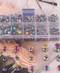 Rainbow Tubular Double Cap Leather Rivets Assorted Size Metal Hardware Kit For Jackets Bags And Diy Gear in a clear box.
