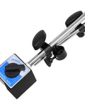 Dial indicator with magnetic base and adjustable long arm; chrome rods, blue base label.