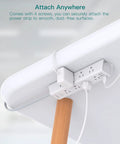 12 Outlet Surge Protector Power Strip With 5 Ft Flat Plug, 3 USB Ports, mounted under desk on wood leg with cords plugged in