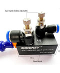 SUCKEY full-sealed mist sprayer block with two brass adjustable valves and blue hose fittings (front view).