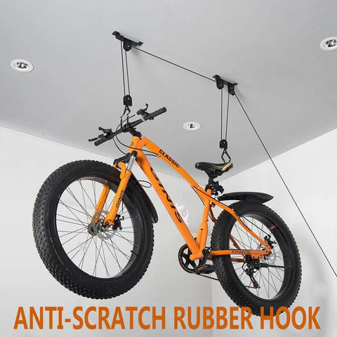 Mounted ceiling bike with bright orange frame using Ceiling Bike Mount Hanger Set Built Tough Steel Bicycle Lift Hoist With Safety Lock Adjustable Height Pulley System For Garage Storage Indoor Bike Hooks Two Pack.