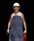Person wearing Pro Grade Cowhide Welding Apron Heat Resistant Shield for Sparks and Splatter Fireproof Soldering Gear
