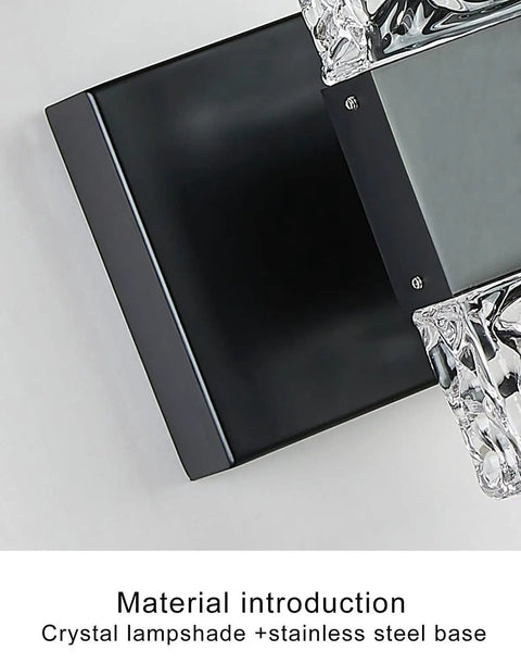 Close-up of Black 4 Light Crystal Bathroom Vanity Light Over Mirror LED Wall Fixture, showing stainless steel base with ice cube accents.