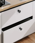 Rock Sick Matte Black Cabinet Knobs, 30-Pack Solid Round Designs For Kitchen And Closet Glow Up on modern white drawers.
