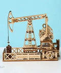 3D Wooden Oil Derrick Model Kit for Adults on blue background, showcasing the dope mechanical engineering DIY project details.
