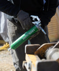 Person using Heavy Duty Pistol Grip Grease Gun With Patented LockNLube Coupler Locks On And Does Not Leak, 20 Inch Hose