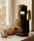 Electric Coffee Bean Roaster Machine For Home Kitchen Using 1500W Motor And Quick Heat Function To Drop Fresh Rich Grounds, displaying beans.