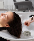 Hair being washed in sink with visible Two Pack Kitchen And Bathroom Sink Drain Strainers Must Have Stainless Steel Hair Catcher