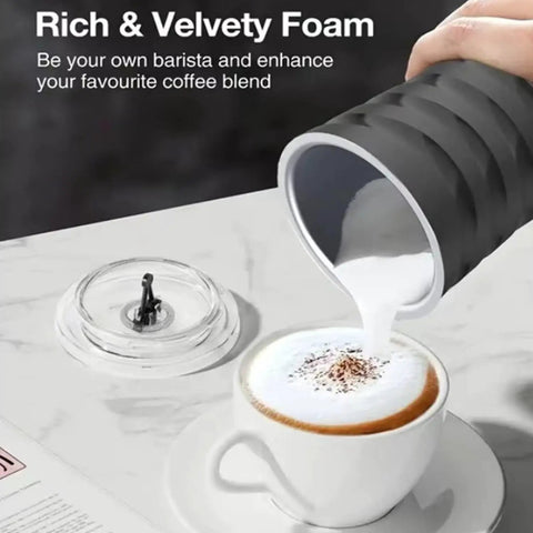 Pouring milk from 4 In 1 Milk Steamer And Frother For Hot And Cold Foam With Temperature Control And Auto Shut Off into a cappuccino.