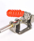 Professional Grade 304 Stainless Steel Toggle Clamp For Woodworking Quick Release Push Pull Hold Down Workbench Fixture Tool With Dead Solid 136 Kg Grip That Locks Real Tight with red handle and shiny steel body.