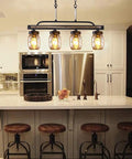 Farmhouse Black Mason Jar Chandelier For Kitchen Island And Dining Table Rustic Linear Pendant Light with four jars in cozy kitchen