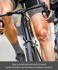 Cyclist gripping handlebars with view of Bike Handlebar Shim Set 1 Pair 25.4 To 31.8 Mm Aluminum Alloy Clamp Spacer Conversion Adapter.