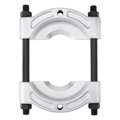 Bearing puller clamp with silver aluminum housing and black guide rods for wheel hub removal