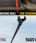 Heavy Duty Adjustable Spud Wrench 16 Inch Long With 1 5 8 Inch Opening Fits Heavy Nuts And Bolts Up To 1 Inch Forged In USA Tether Hole For Safe Work Lanyard Compatible Built For Tough Job Sites hanging from a lanyard on a work boot.