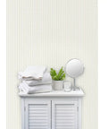 Top Shelf Heavy Duty Vinyl Wallpaper Featuring A Subtle Leather Texture Custom Printed For Commercial Spaces Offices Hotels Paste Required Pro Approved Wallcovering with white towels and a plant.