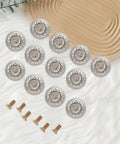 16 Piece Vintage Silver Flower Embossed Drawer Knobs For Kitchens And Dressers Compact Round Metal Pulls With Matching Screws set displayed.