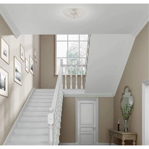 Cassandra 4 Light Brushed Nickel Ceiling Mount Fixture With K9 Crystal Glass illuminating a modern hallway.