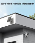 Dual Lens Solar Wireless Outdoor Security Cameras No Blind Spots With 2K Full HD Video And 360 Degree Pan Tilt Color Night Vision Easy Install PIR Motion Alarm 2.4GHz WiFi Ready mounted on a building corner next to a solar panel.