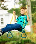 Child on Heavy Duty Gym Rings Trapeze Swing Bar with 16 Inch Bar and 47 Inch Chain in backyard playground