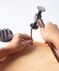 Person using Leather Punch Kit For DIY Leathercraft, 4mm Hole Punch Set With 1 2 4 6 Teeth, Pro Grade High Speed Steel prong chisel