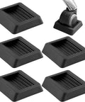 Grippy Silicone Furniture Pads For 1 To 4 Inch Wheels Keeps Office Chairs Beds And Couches From Sliding On Carpet Or Hard Floors Protects Surfaces With Durable Caster Cups Safe Non Slip Grips 5 Pack, showing black silicone pads with wheel installed.