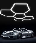 Hexagon LED Garage Lights 25 Pack Ultra Bright 6700K Ceiling Lighting installed above a sports car