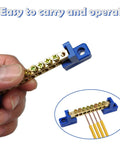 Hand holding Heavy Duty Grounding Bus Bar Kit 4 Pack with brass terminals, showcasing six-position terminal block.