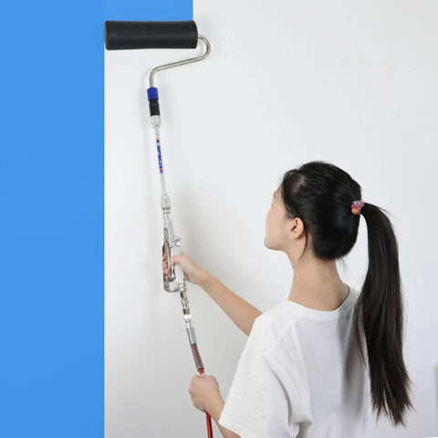 Person using Inner Feed Airless Paint Sprayer Gun Attachment Kit with 10 inch roller extension painting a wall blue.