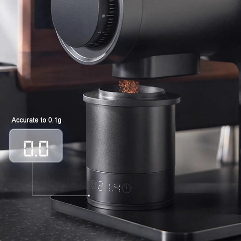 Total Game Changer Aluminum Coffee Dosing Cup And Espresso Digital Scale Combo With Rechargeable Sensor And 0.1 Gram Precision For Classic 58Mm Portafilters Rock Solid Gear showing precision scale measuring coffee grounds.