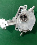 Heavy Duty Dual Automotive Vacuum Pump Assembly With Rock Solid Silver Build For Reliable Fluid Transfer Compact Industrial Setup shown from top angle, featuring aluminum body and connection ports.