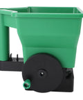 Green Handheld 3L Manual Lawn Spreader For Fertilizer And Salt Compact Portable Yard Care Tool showing side view with black wheels.