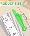Fish Mouth Needle Threader For Sewing Machines And Hand Use Automatic Needle Threader Tool next to ruler for size comparison