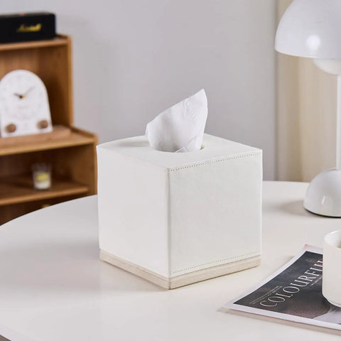 Hand Carved Beige Leather Cube Tissue Box Holder With Square Resin Cover Five Point Five Inch on a white table