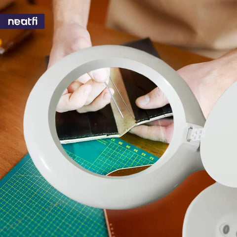 Close-up of All In One LED Magnifying Lamp with Dust Cover, 5 Inch Glass Lens, 5 Diopter showing detailed crafting work.
