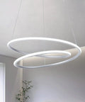 Sleek Modern LED Pendant Ring Chandelier With Dimmable Cool White 6000K Light for dining room and foyer, silver round ceiling fixture.