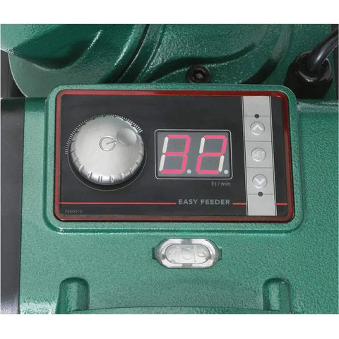 Close-up of Pro Grade Three Roller Variable Speed Power Feeder With Brushless 220V Motor digital control panel showing speed settings.