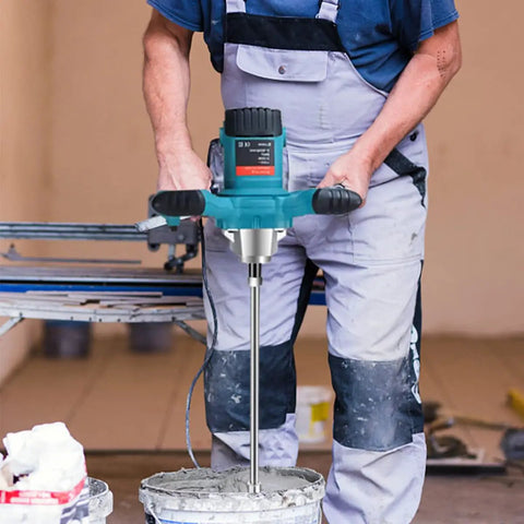 Person using Powerful 2100W Portable Concrete Mixer With Six Speed Settings, Handheld Cement Mixer for mortar.