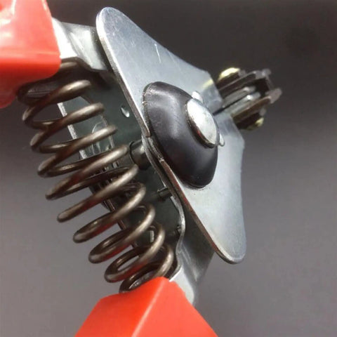 Close-up view of Top Tier Automatic Wire Stripper Slick Cable Crimper with metallic spring and ergonomic handle.